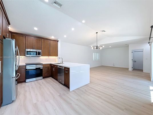 Interior, Kitchen, Pendant Lights, Recessed Lighting, Stainless Steel Appliances, Wood Texture Flooring