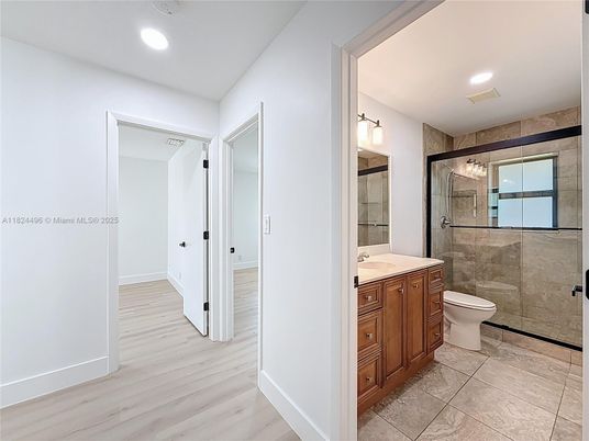 Bathroom, Glass Shower, Interior, Recessed Lighting, Wood Texture Flooring