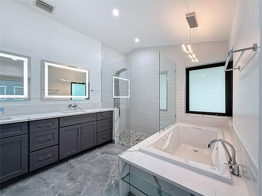 Bathroom, Dual Sink Vanities, Glass Shower, Interior, Marble, Recessed Lighting