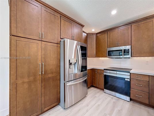 Interior, Kitchen, Recessed Lighting, Stainless Steel Appliances, Wood Texture Flooring