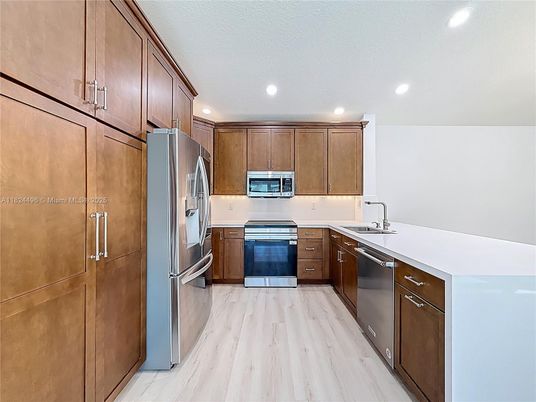 Interior, Kitchen, Recessed Lighting, Stainless Steel Appliances, Wood Texture Flooring