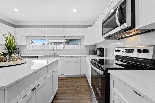 Interior, Kitchen, Recessed Lighting, Stainless Steel Appliances, Wood Texture Flooring