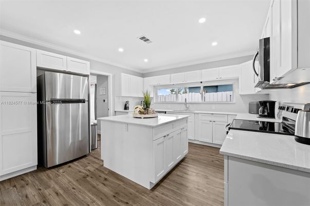 Interior, Kitchen, Recessed Lighting, Stainless Steel Appliances, Wood Texture Flooring