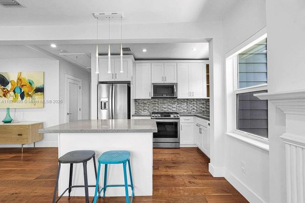 Interior, Kitchen, Pendant Lights, Recessed Lighting, Stainless Steel Appliances, Wood Texture Flooring