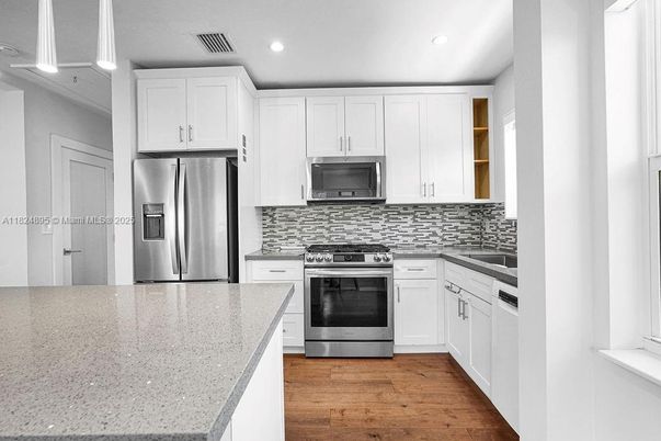 Interior, Kitchen, Recessed Lighting, Stainless Steel Appliances, Wood Texture Flooring