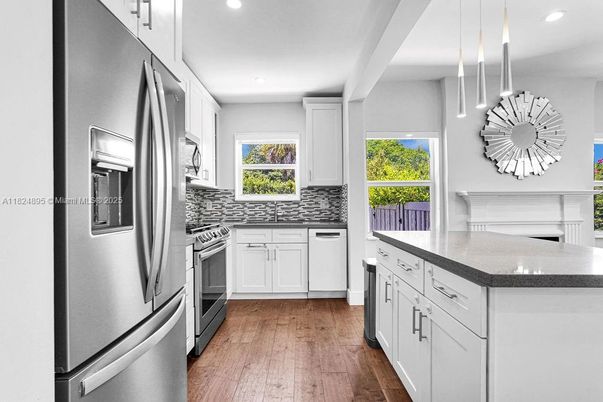 Interior, Kitchen, Pendant Lights, Recessed Lighting, Stainless Steel Appliances, Wood Texture Flooring