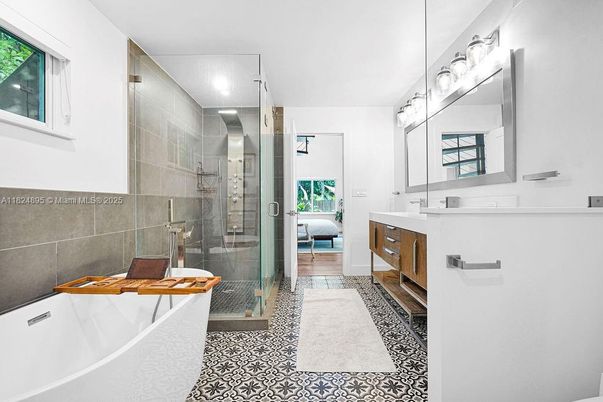 Bathroom, Dual Sink Vanities, Glass Shower, Interior, Recessed Lighting, Wood Texture Flooring