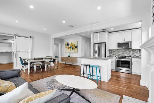 Dining room, Interior, Kitchen, Living room, Pendant Lights, Recessed Lighting, Stainless Steel Appliances, Wood Texture Flooring