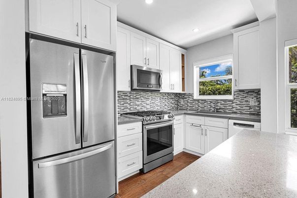 Interior, Kitchen, Recessed Lighting, Stainless Steel Appliances, Wood Texture Flooring