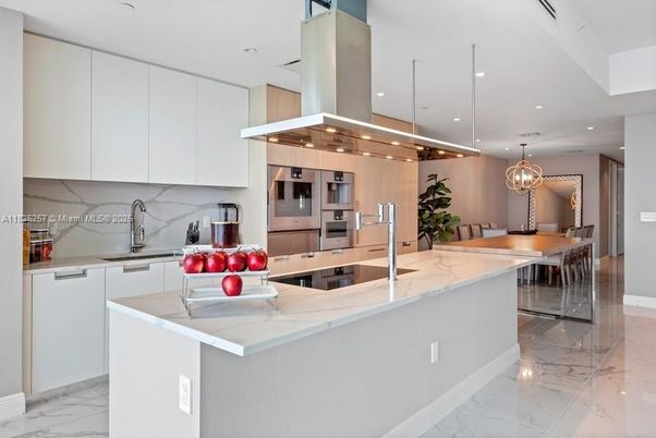 Chandelier, Dining room, Interior, Kitchen, Marble, Pendant Lights, Recessed Lighting, Stainless Steel Appliances