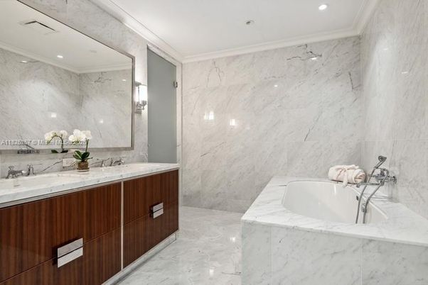 Bathroom, Dual Sink Vanities, Interior, Marble, Marble Walls, Recessed Lighting