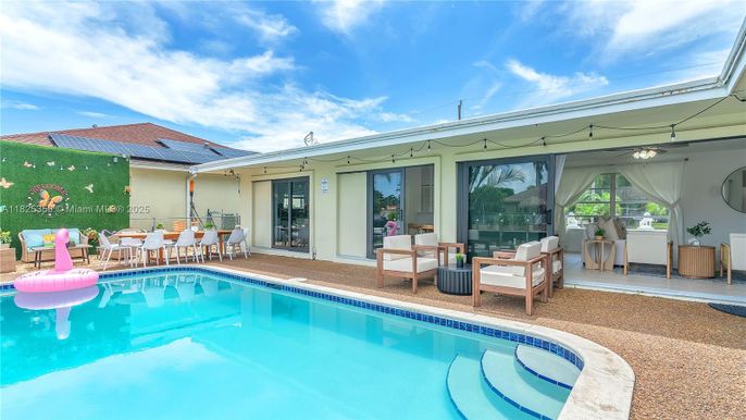 Exterior, Pool, Solar Panels