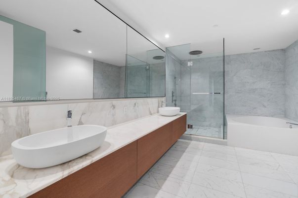 Bathroom, Dual Sink Vanities, Free Standing Baths, Glass Shower, Interior, Marble, Marble Walls, Recessed Lighting