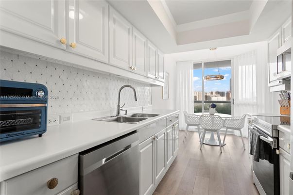 Dining room, Interior, Kitchen, Pendant Lights, Stainless Steel Appliances, Water, Wood Texture Flooring
