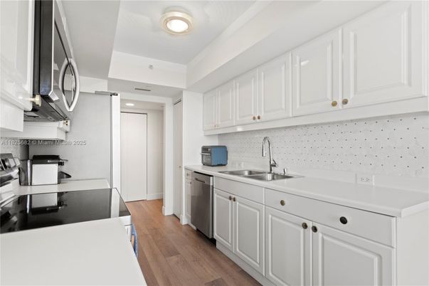 Interior, Kitchen, Recessed Lighting, Stainless Steel Appliances, Wood Texture Flooring