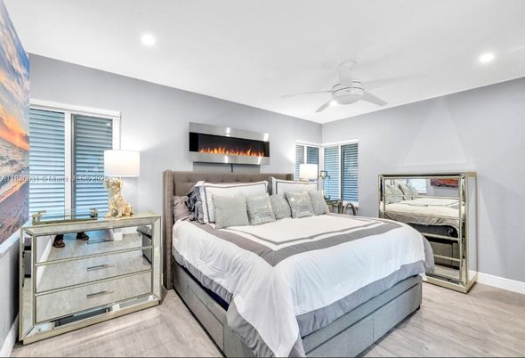 Bedroom, Fireplace, Interior, Recessed Lighting, Wood Texture Flooring