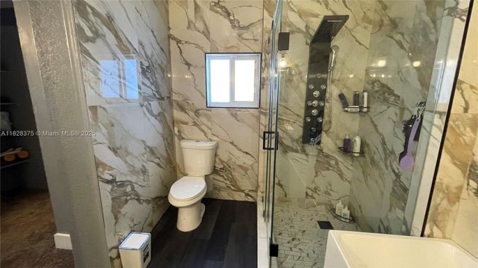 Bathroom, Glass Shower, Interior, Marble Walls, Wood Texture Flooring