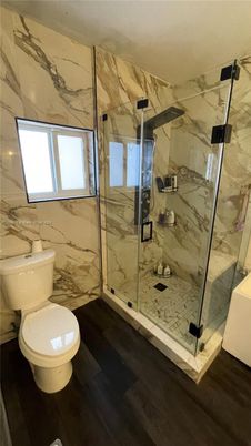 Bathroom, Glass Shower, Interior, Marble Walls, Wood Texture Flooring