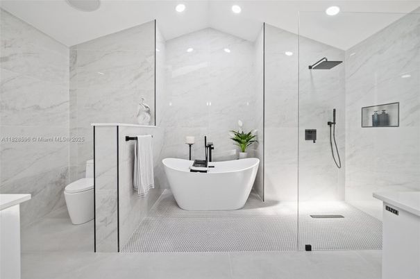 Bathroom, Free Standing Baths, Glass Shower, Interior, Marble Walls, Recessed Lighting