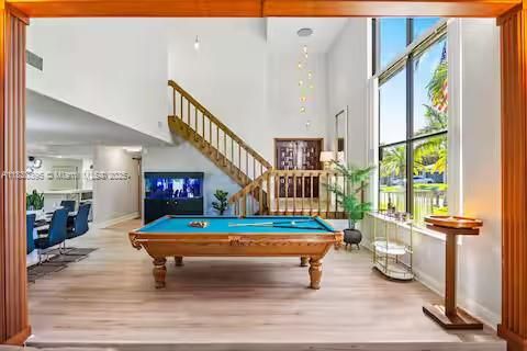 Billiard Table, Chandelier, Game Room, Interior, Pendant Lights, Wooden Beams, Wood Texture Flooring
