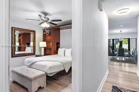 Bedroom, Chandelier, Dining room, Interior, Pendant Lights, Recessed Lighting, Wood Texture Flooring