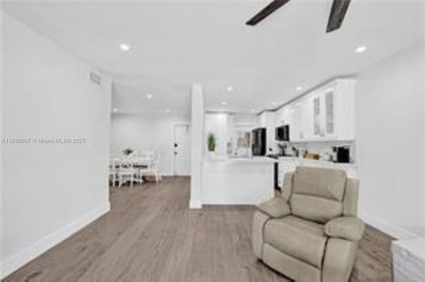 Dining room, Interior, Kitchen, Recessed Lighting, Stainless Steel Appliances, Wood Texture Flooring