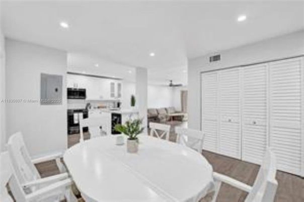 Dining room, Interior, Kitchen, Recessed Lighting, Stainless Steel Appliances, Wood Texture Flooring