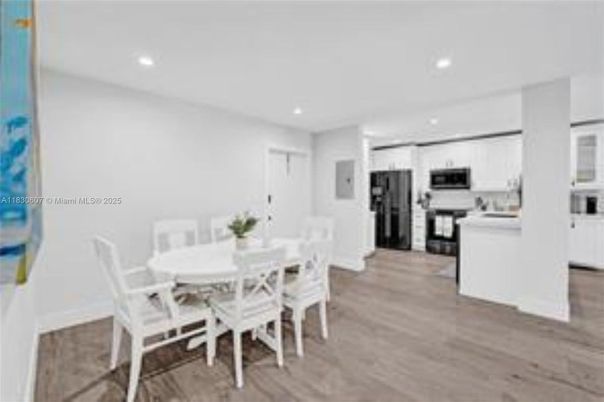 Dining room, Interior, Kitchen, Recessed Lighting, Stainless Steel Appliances, Wood Texture Flooring