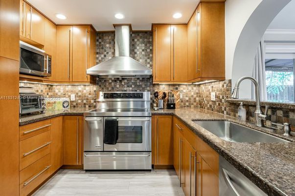 Interior, Kitchen, Recessed Lighting, Stainless Steel Appliances, Wood Texture Flooring