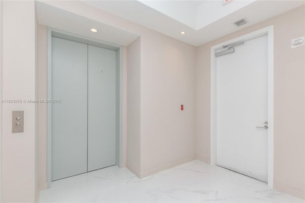 Elevator, Interior, Marble, Recessed Lighting