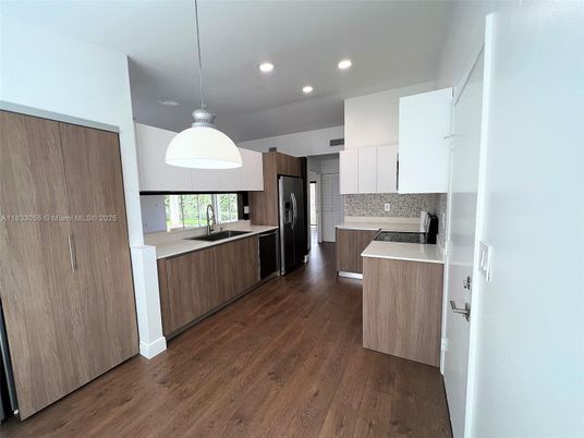 Interior, Kitchen, Pendant Lights, Recessed Lighting, Stainless Steel Appliances, Wood Texture Flooring