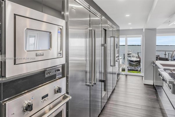 Interior, Kitchen, Recessed Lighting, Stainless Steel Appliances, Water, Wood Texture Flooring