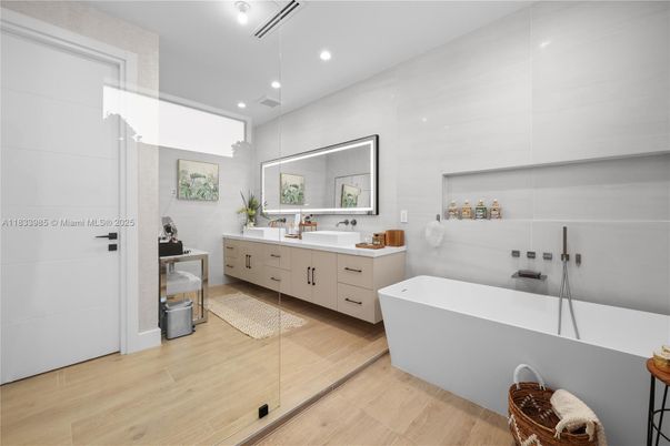 Bathroom, Dual Sink Vanities, Free Standing Baths, Glass Shower, Interior, Recessed Lighting, Wood Texture Flooring
