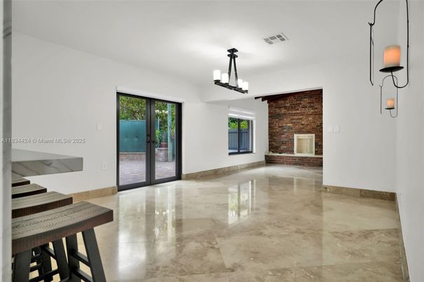 Chandelier, Empty room, Fireplace, Interior, Pendant Lights, Stone Walls
