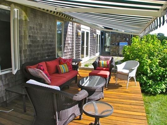Exterior, Wood Texture Flooring, Brick Facade