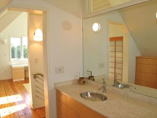 Interior, Bathroom, Wood Texture Flooring, Dual Sink Vanities