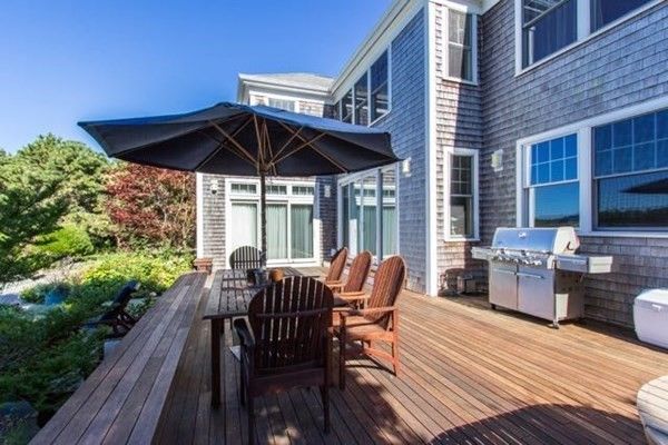 Exterior, Wood Texture Flooring, Brick Facade
