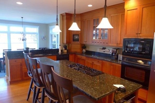 Interior, Kitchen, Wood Texture Flooring, Recessed Lighting, Dining room, Stainless Steel Appliances, Pendant Lights