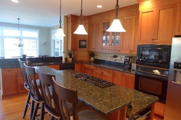 Interior, Kitchen, Wood Texture Flooring, Recessed Lighting, Dining room, Stainless Steel Appliances, Pendant Lights