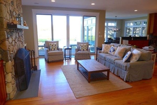 Interior, Wood Texture Flooring, Recessed Lighting, Living room, Dining room, Fireplace, Chandelier, Stone Walls, Pendant Lights