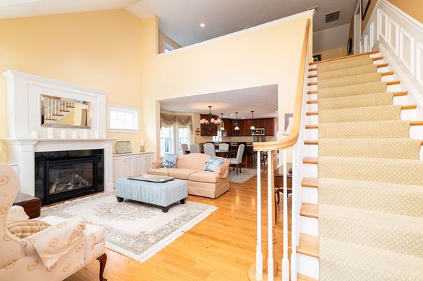 Chandelier, Dining room, Fireplace, Interior, Living room, Pendant Lights, Recessed Lighting, Wood Texture Flooring