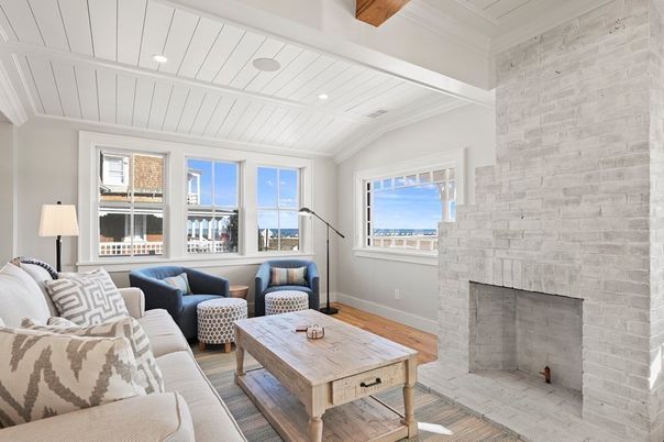 Fireplace, Interior, Living room, Recessed Lighting, Stone Walls, Wood Texture Flooring