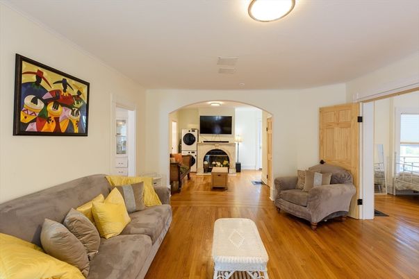 Interior, Living room, Utility Closets, Washer, Wood Texture Flooring