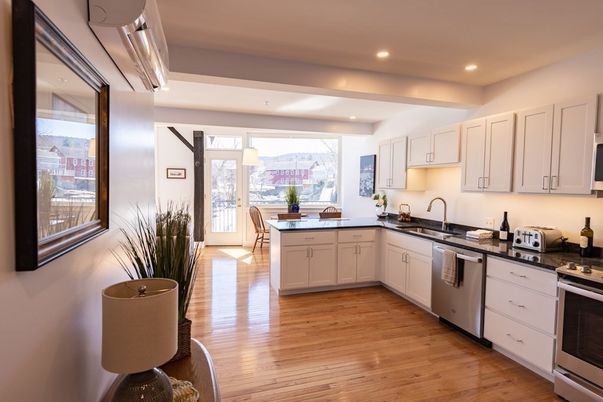 Dining room, Interior, Kitchen, Pendant Lights, Recessed Lighting, Stainless Steel Appliances, Wood Texture Flooring