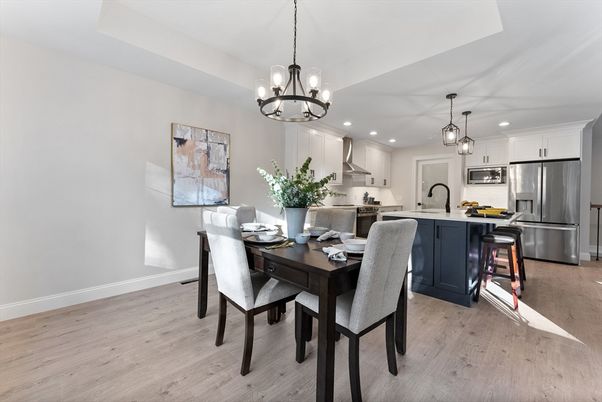 Chandelier, Dining room, Interior, Kitchen, Pendant Lights, Recessed Lighting, Stainless Steel Appliances, Wood Texture Flooring