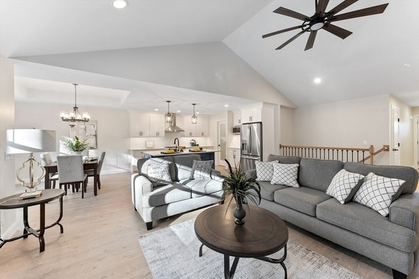 Chandelier, Dining room, Interior, Kitchen, Living room, Pendant Lights, Recessed Lighting, Stainless Steel Appliances, Wood Texture Flooring