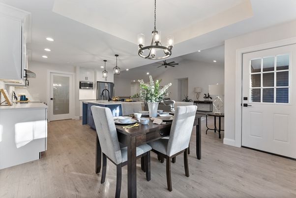 Chandelier, Dining room, Interior, Kitchen, Pendant Lights, Recessed Lighting, Stainless Steel Appliances, Wood Texture Flooring