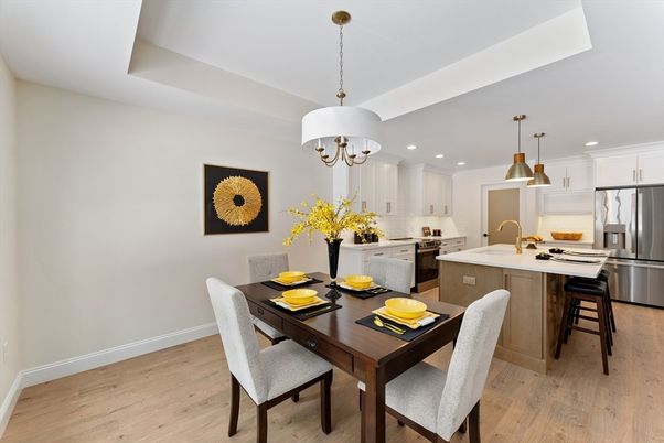 Chandelier, Dining room, Interior, Kitchen, Pendant Lights, Recessed Lighting, Stainless Steel Appliances, Wood Texture Flooring