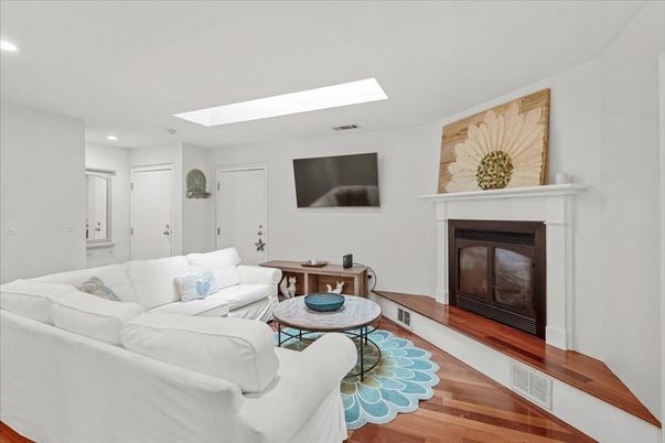 Fireplace, Interior, Living room, Recessed Lighting, Wood Texture Flooring