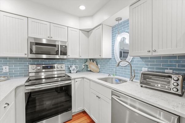 Interior, Kitchen, Recessed Lighting, Stainless Steel Appliances, Wood Texture Flooring